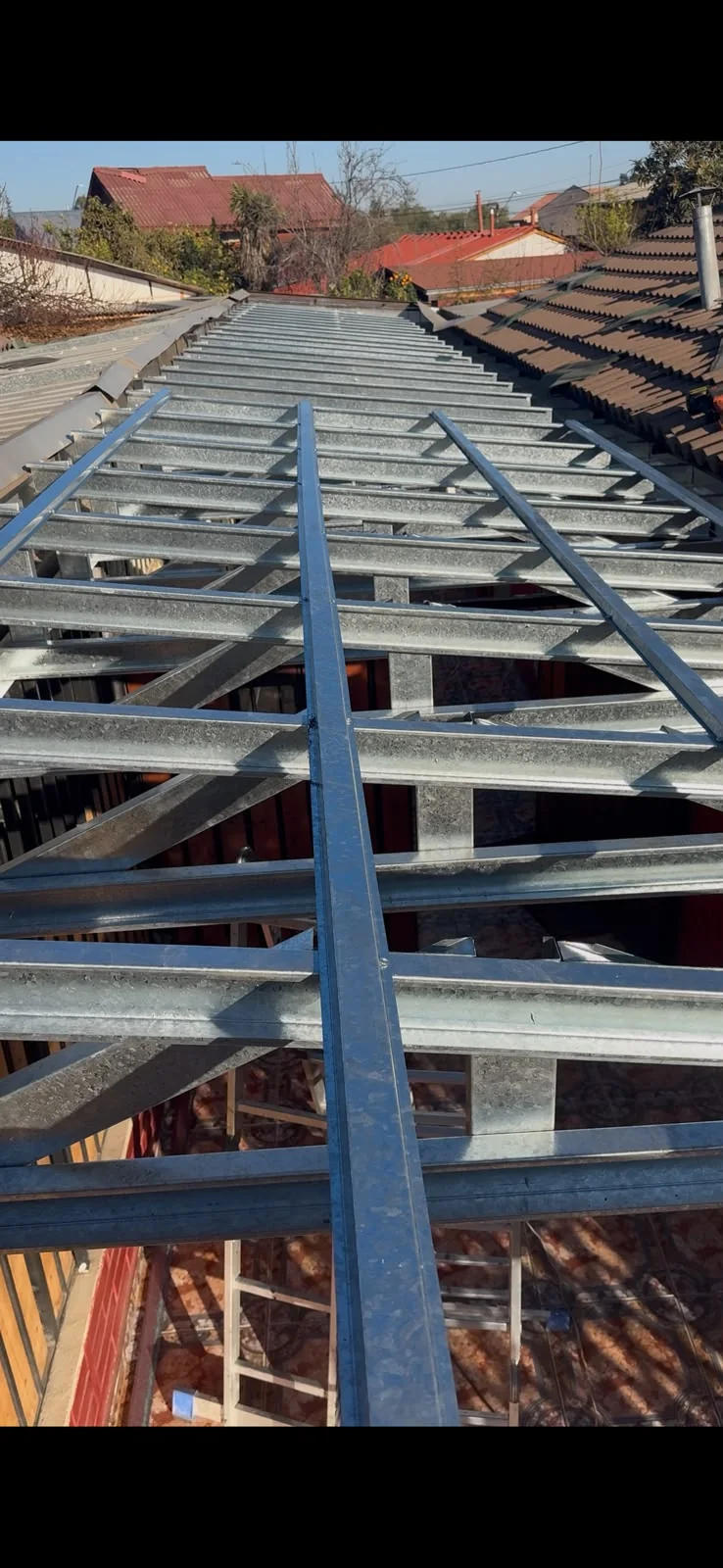 Cobertizo y cierre perimetral en Puente Alto · fotografía 9